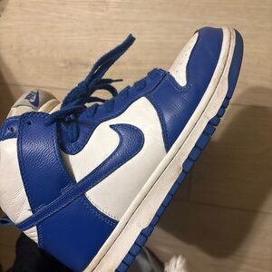 Used. Blue and White High-Top Sneakers